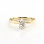 10k gold oval cut moissanite four prong solitaire engagement ring 1
