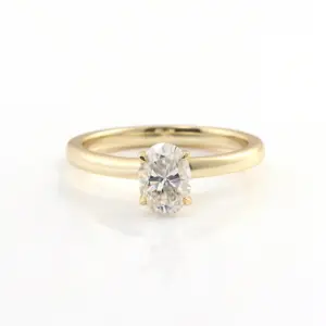 10k gold oval cut moissanite four prong solitaire engagement ring 1