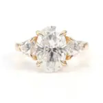 10k gold oval moissanite four prong three stone engagement ring 1
