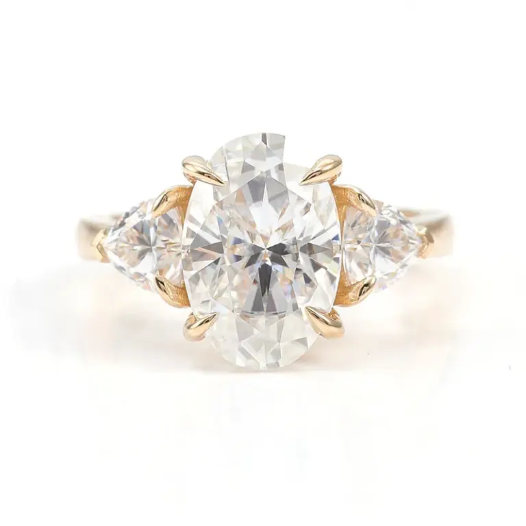 10k gold oval moissanite four prong three stone engagement ring 1
