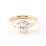 10k gold oval moissanite prong set three stone engagement ring 1
