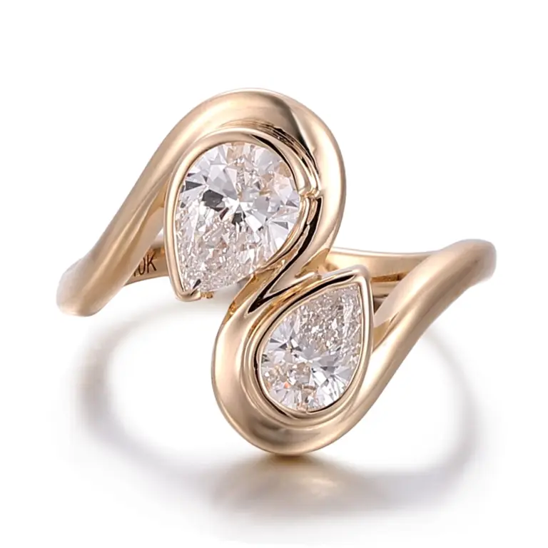 10k gold pear shape moissanite bezel toi et moi engagement ring 1