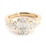 14k gold cushion moissanite prong set three stone engagement ring 1