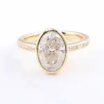 14k gold oval cut moissanite bezel straight engagement ring 1