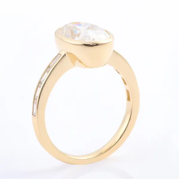 14K Gold Oval Cut Moissanite Bezel Side Stone Engagement Ring ...