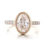 14k gold oval lab grown diamond bezel side stone engagement ring 1