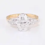 14k gold oval moissanite prong set three stone engagement ring 1
