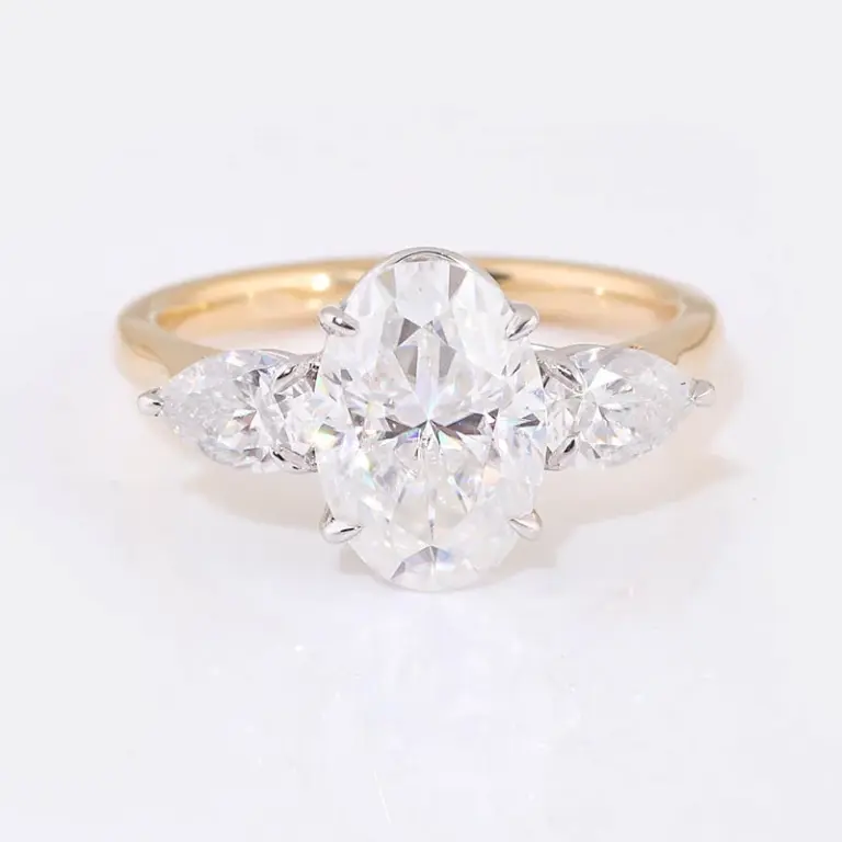 14k gold oval moissanite prong set three stone engagement ring 1