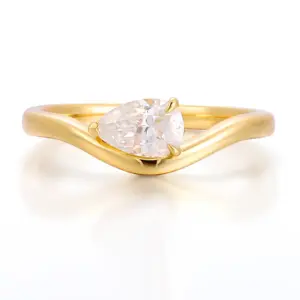 14k gold pear shape moissanite three prong solitaire engagement ring 1