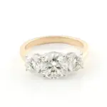 14k gold round moissanite prong set three stone engagement ring 1