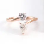 14k rose gold round pear moissanite prong set toi et moi engagement ring 1