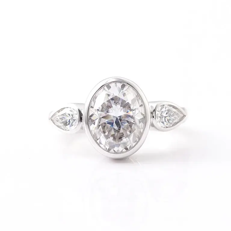 14k white gold oval moissanite bezel three stone engagement ring 1