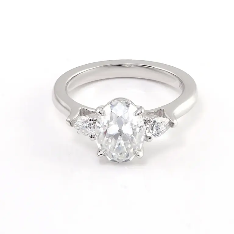 14k white gold oval moissanite prong set three stone engagement ring 1