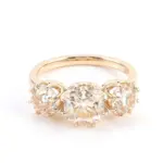 18k gold cushion moissanite four prong three stone engagement ring 1
