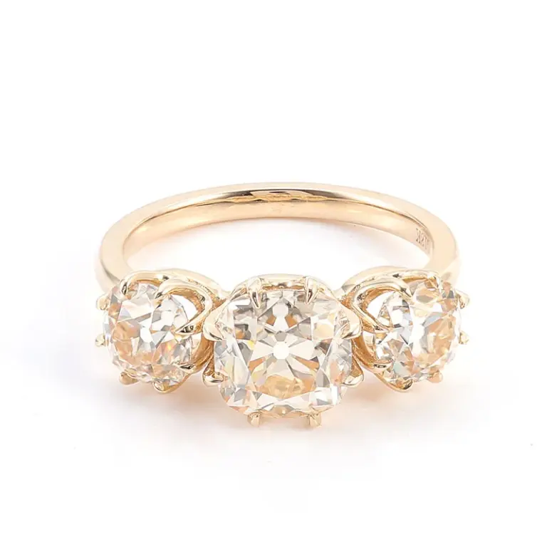 18k gold cushion moissanite four prong three stone engagement ring 1