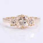 18k gold cushion moissanite prong set three stone engagement ring 1