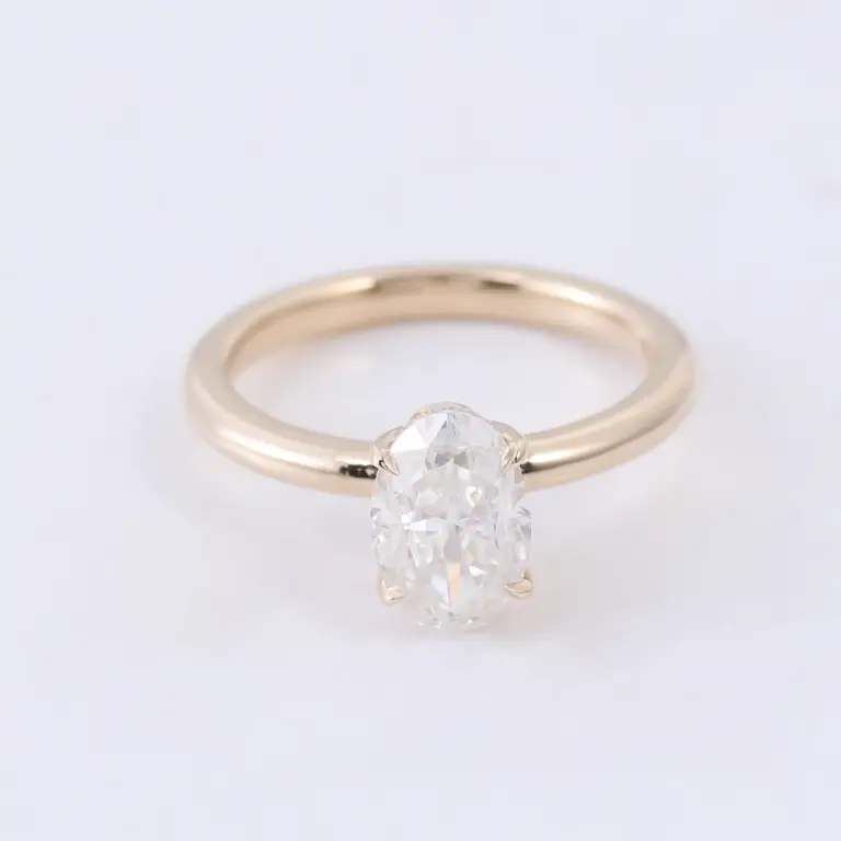 18k gold oval moissanite four prong solitaire engagement ring 1