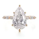 18k gold pear lab grown diamond prong set side stone engagement ring 1
