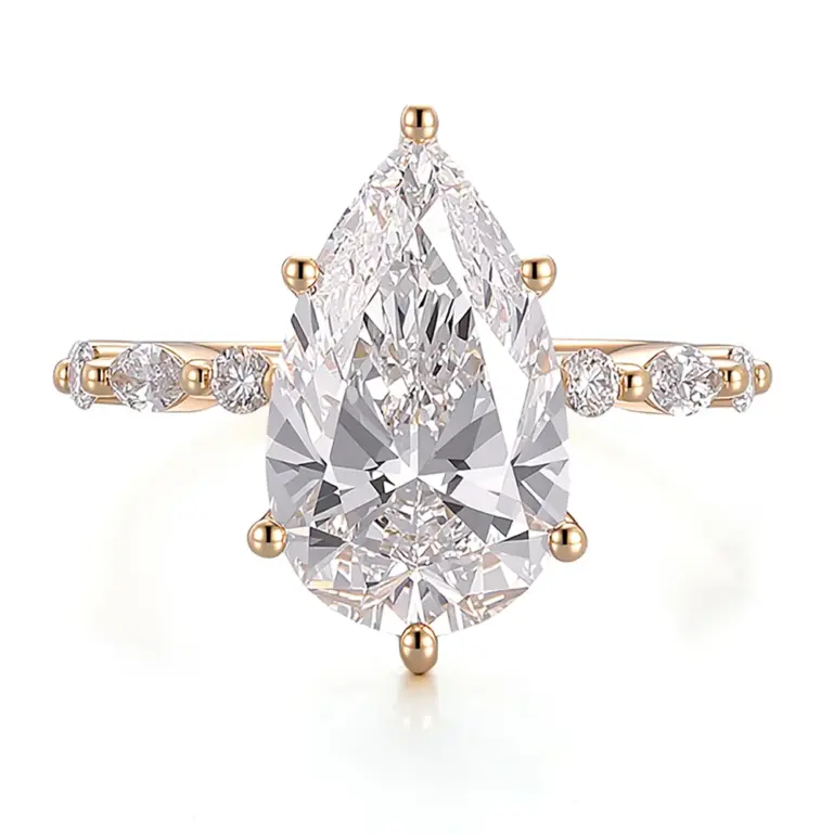 18k gold pear lab grown diamond prong set side stone engagement ring 1