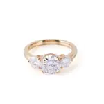 18k gold round moissanite prong set three stone engagement ring 1