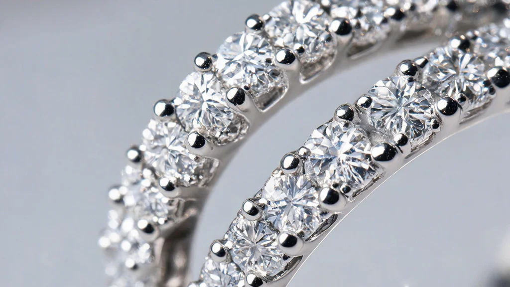 Micro pavé diamond band close up showing the individual stones and metal bead setting