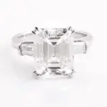 platinum emerald cut moissanite prong set three stone engagement ring 1