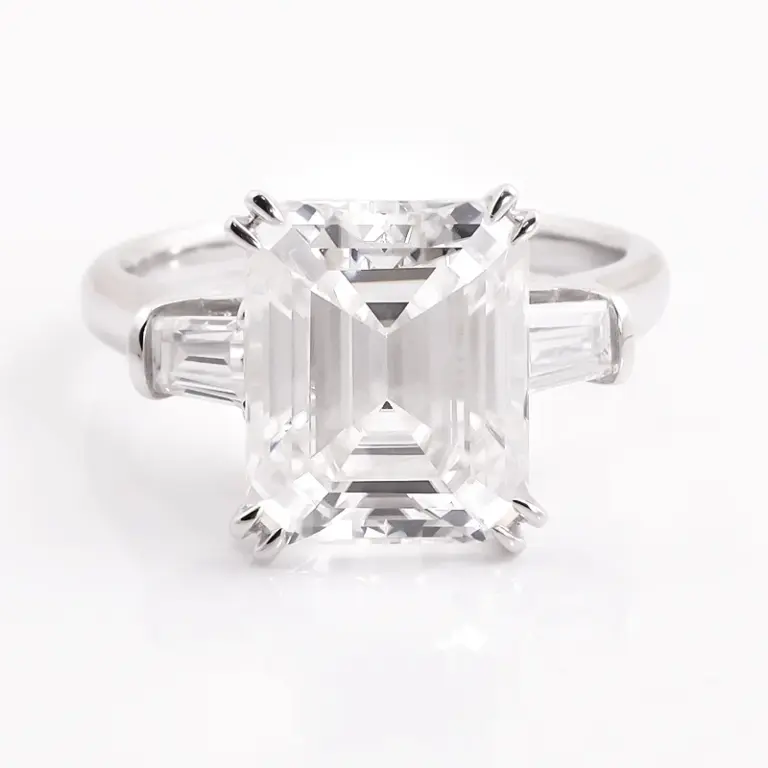 platinum emerald cut moissanite prong set three stone engagement ring 1