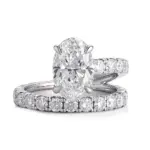 platinum oval lab grown diamond prong set split shank engagement ring 1