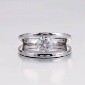 platinum round cut moissanite channel split shank engagement ring 1