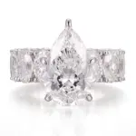 14k white gold pear lab grown diamond prong set side stone engagement ring 1