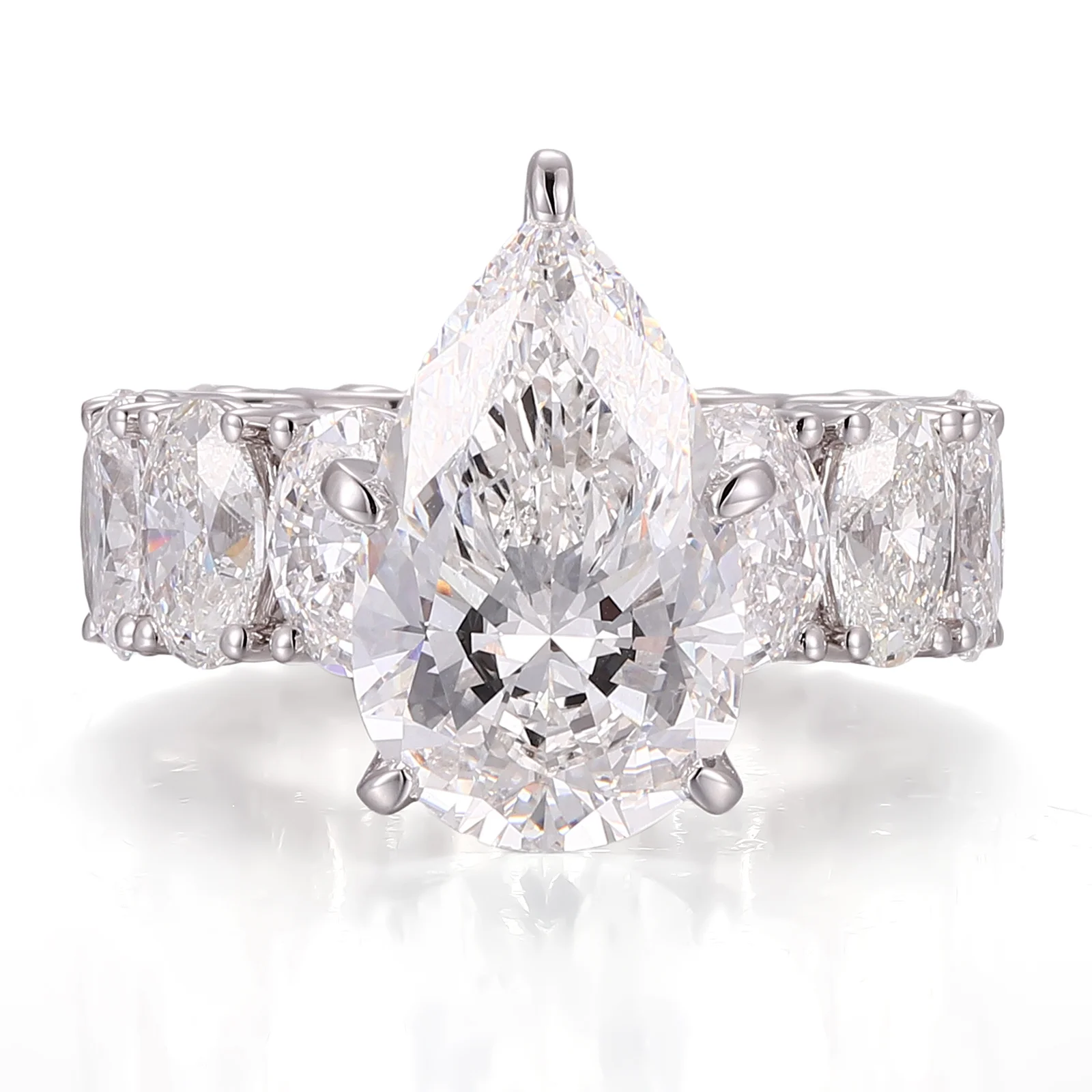 14k white gold pear lab grown diamond prong set side stone engagement ring 1 14k white gold pear lab grown diamond prong set side stone engagement ring 1