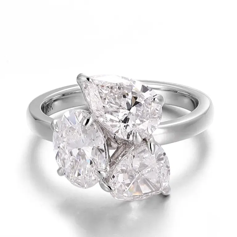 18k white gold pear lab grown diamond prong set three stone engagement ring 1