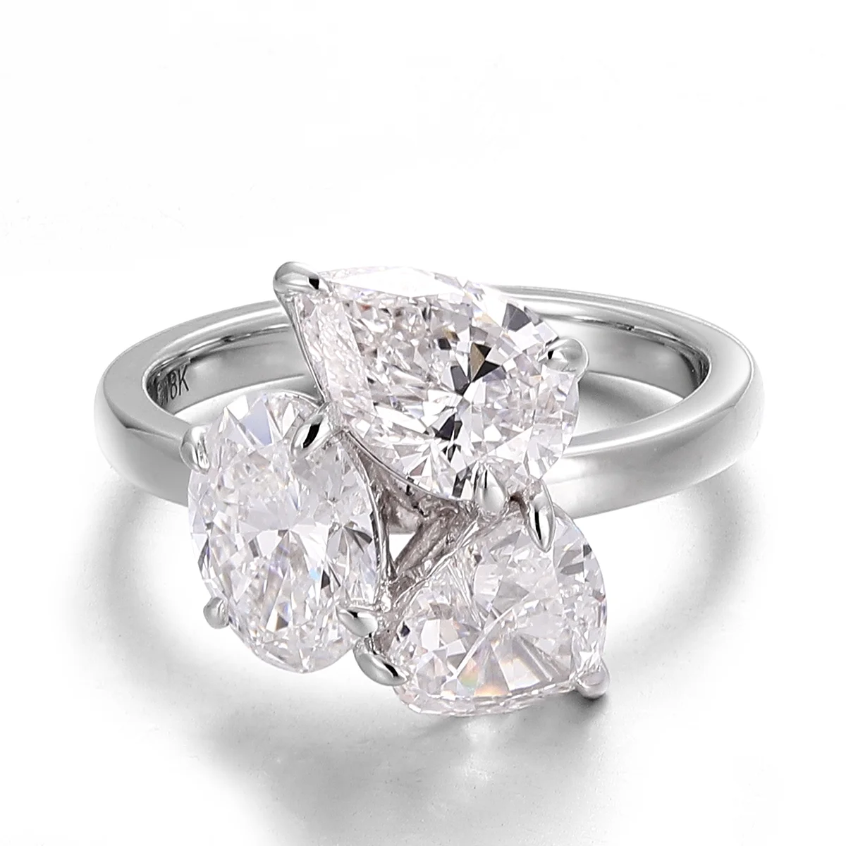 18k white gold pear lab grown diamond prong set three stone engagement ring 1 18k white gold pear lab grown diamond prong set three stone engagement ring 1