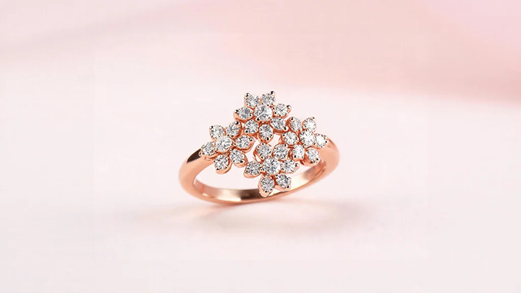 Diamond cluster engagement ring in a floral rose gold design