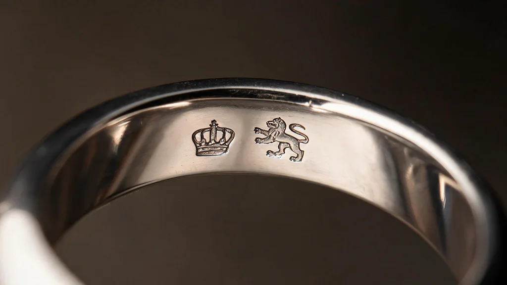 UK hallmark stamp on a platinum ring band