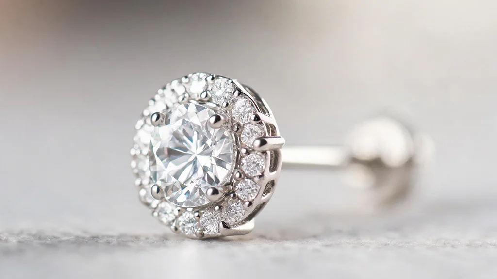 Diamond halo stud earring on earlobe