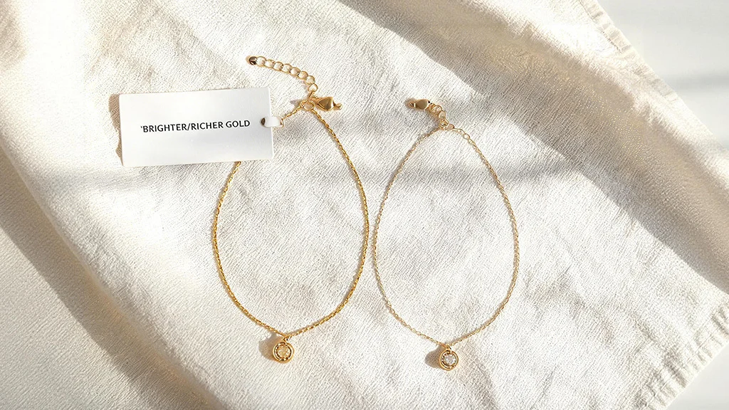 comparison of gold filled vs gold plated necklaces side by side