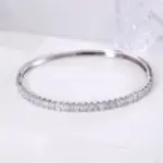 emerald lab grown diamond modern bangle bracelet in 14k gold 1