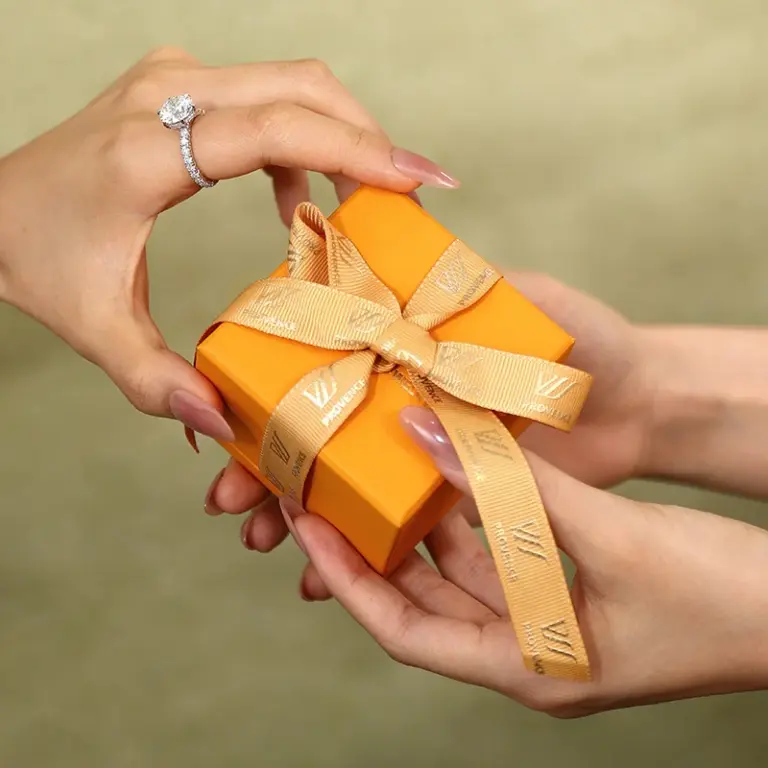 giving a jewelry gift with luxury jewelry packaging