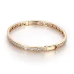 minimalist 18k gold bangle bracelet featuring emerald round lab grown diamonds 1