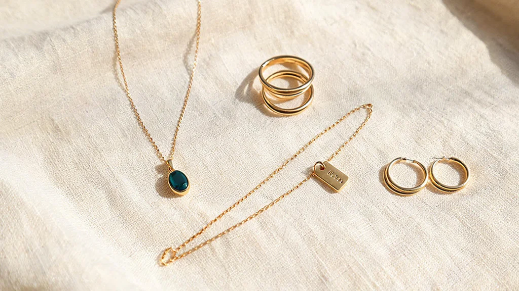 Assorted fine jewelry pieces representing different jewelry niches, including birthstone, minimalist, and personalized styles