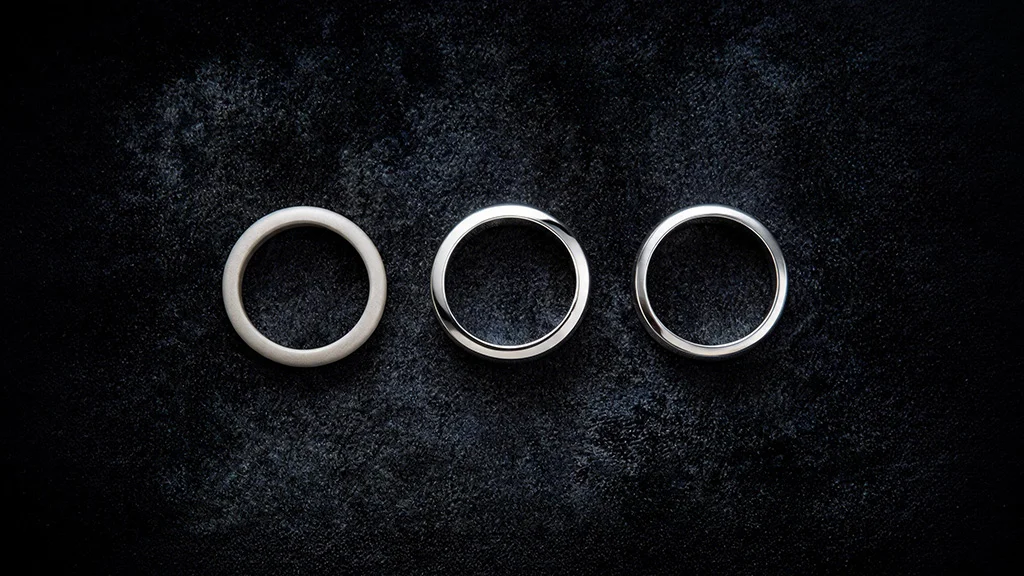 Side by side comparison of unplated white gold, rhodium plated white gold, and platinum rings