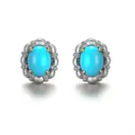 Brincos de ouro 14k com diamantes e detalhes em turquesa.