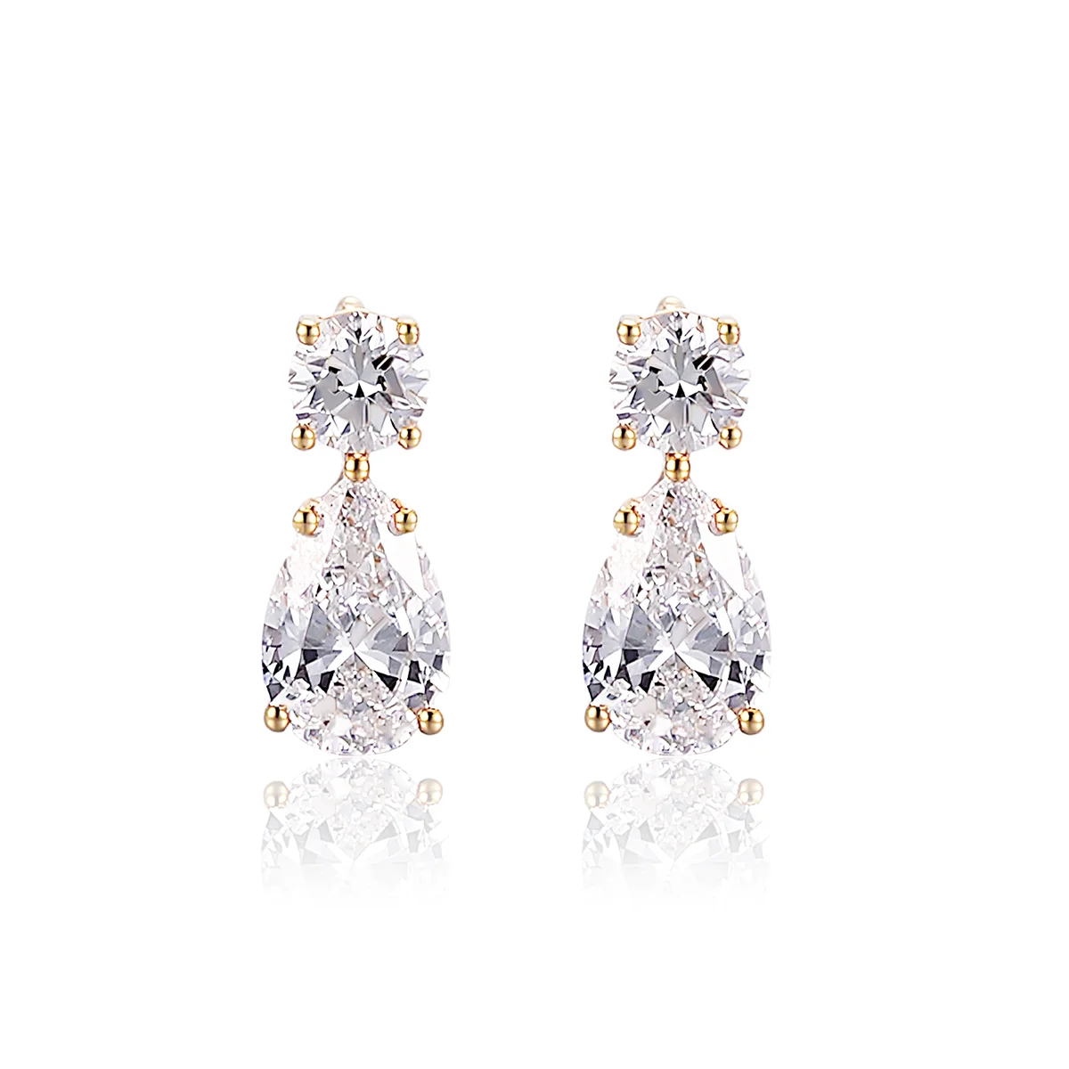 18k gold round and pear lab grown diamond two stone stud earrings 1 18k gold round and pear lab grown diamond two stone stud earrings 1