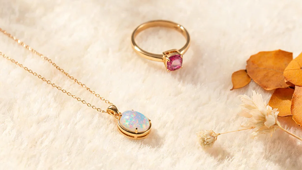 Opal pendant necklace and pink tourmaline ring, October's birthstones in 14K gold settings