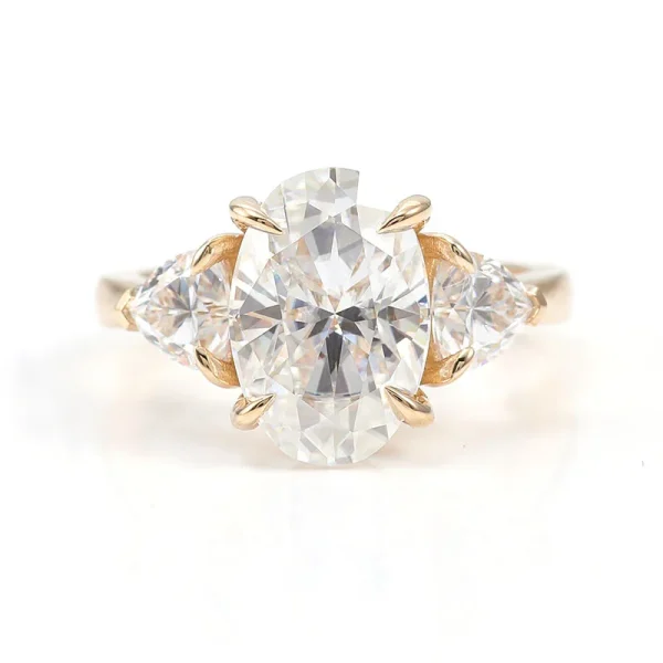 10k gold oval moissanite four prong three stone engagement ring 1